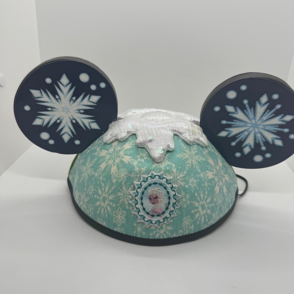 Disney Frozen Themed Mickey Ears with Blue and White Snowflake Design